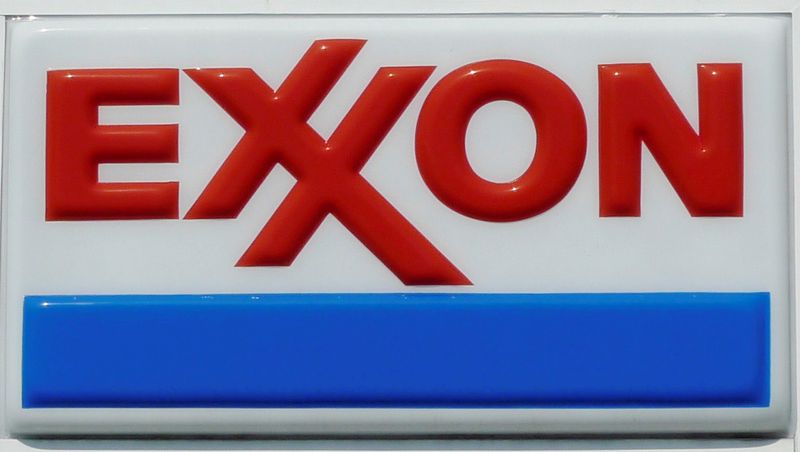 FILE PHOTO: The Exxon corporate logo is pictured at one of the company's gas stations in Arlington