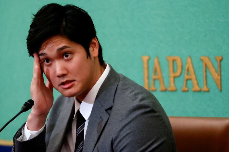 FILE PHOTO: Japanese two-way baseball player for the Los Angeles Angels, Shohei Ohtani, attends a news conference at the Japan National Press Club in Tokyo