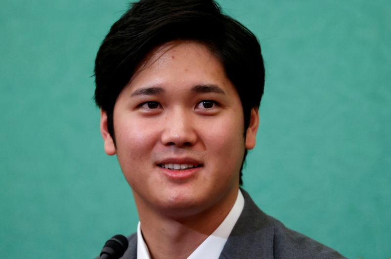 FILE PHOTO: Japanese two-way baseball player for the Los Angeles Angels Shohei Ohtani attends a news conference at the Japan National Press Club in Tokyo