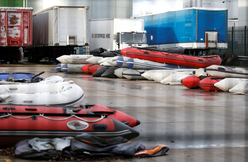 FILE PHOTO: Inflatable boats, believed to have been used by migrants that crossed the English Channel from France, are stored in a secure facility near Dover