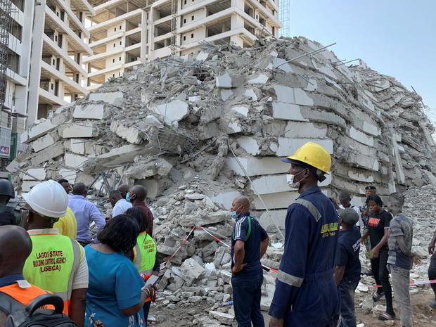 Dozens feared trapped after deadly collapse of high-rise in Nigeria