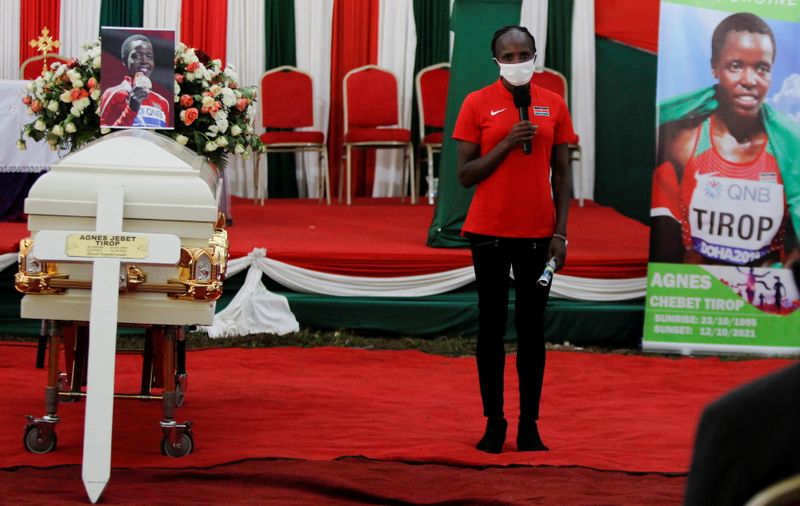 Kenyan athlete Hellen Obiri speaks during the funeral service of long-distance runner Agnes Tirop at Kapnyamisa village