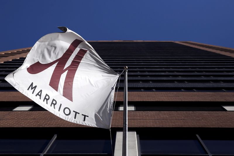 FILE PHOTO: A Marriott flag hangs at the entrance of the New York Marriott Downtown hotel in Manhattan, New York