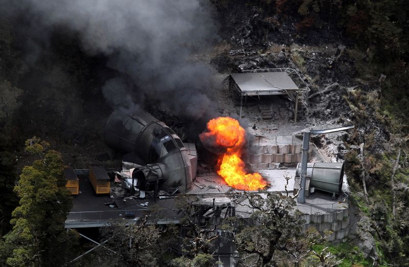 FILE PHOTO: Flame burns from the end of a ventilation shaft of the Pike River coal mine near Greymouth