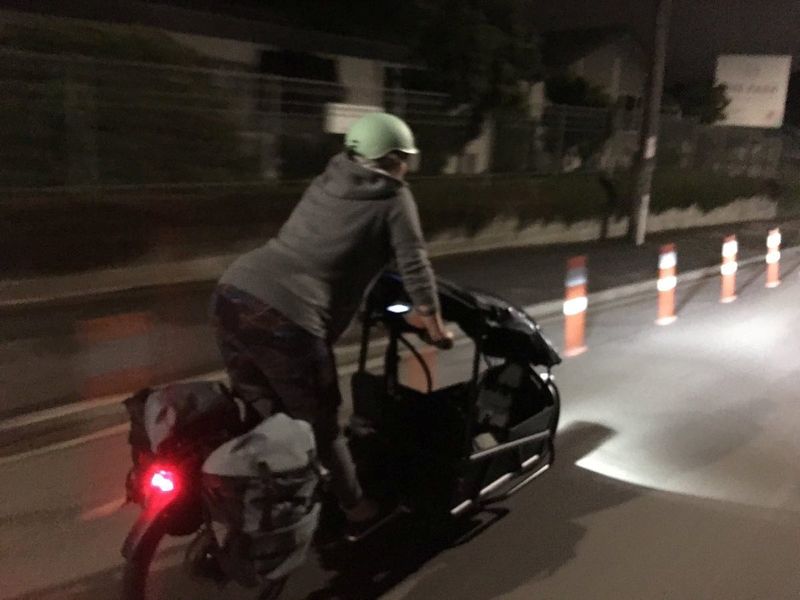 Green Party MP Julie Anne Genter rides a bicyle to the hospital while in labour in Wellington