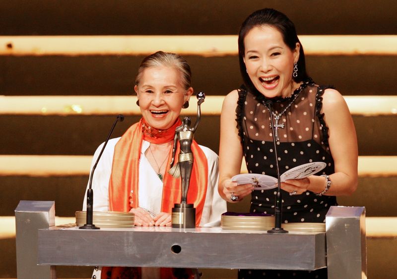 FILE PHOTO: Japanese movie costume designer Wada and Hong Kong actress Yip at the Hong Kong Film Awards in 2006