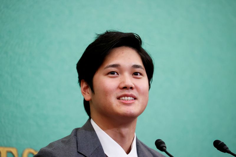 FILE PHOTO: Japanese two-way baseball player for the Los Angeles Angels Shohei Ohtani attends a news conference at the Japan National Press Club in Tokyo