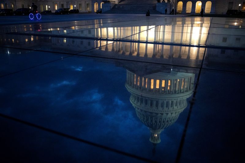 A bicyclist rides along the East Front Plaza at the U.S. Capitol in Washington