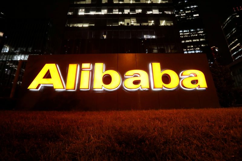 FILE PHOTO: Logo of Alibaba Group is seen at its office building in Beijing, China