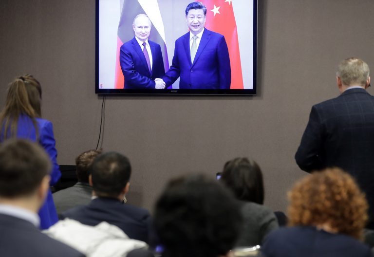 China and Russia show solidarity, but likely won’t support each other militarily, analysts say