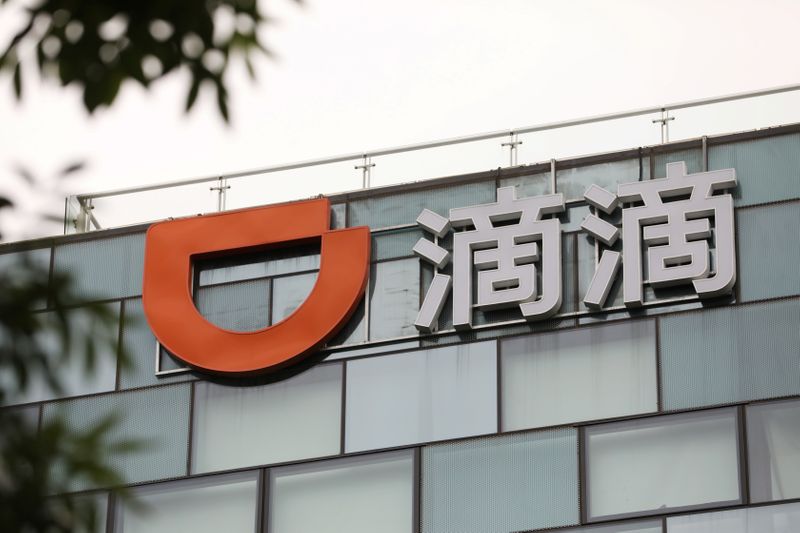 Sign of Chinese ride-hailing service Didi is seen on its headquarters in Beijing,