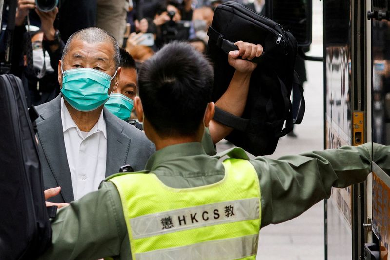 FILE PHOTO: Media mogul Jimmy Lai, founder of Apple Daily, leaves the Court of Final Appeal by prison van in Hong Kong