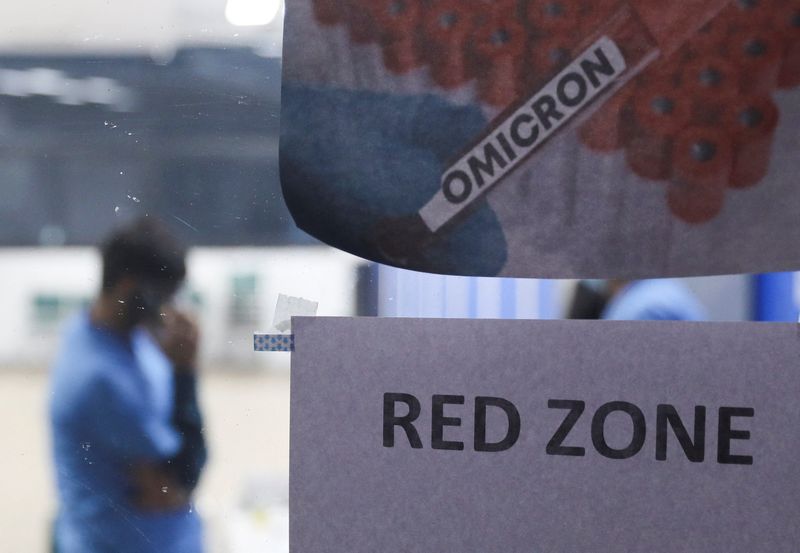 Man waits inside a COVID care centre set up amidst the spread of the coronavirus disease (COVID-19), in New Delhi