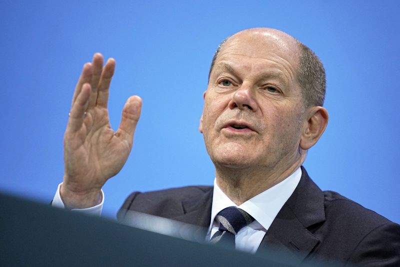 FILE PHOTO: German Chancellor Olaf Scholz attends a news conference in the Federal Chancellery