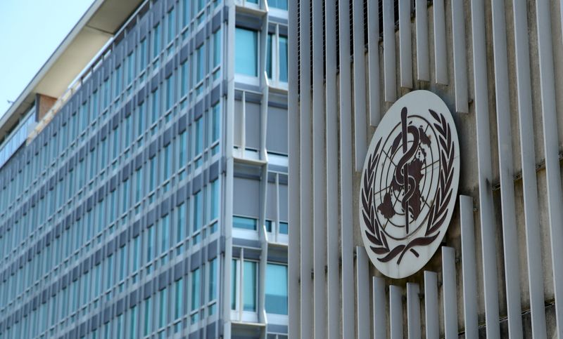 FILE PHOTO: A logo is pictured on the headquarters of the WHO in Geneva