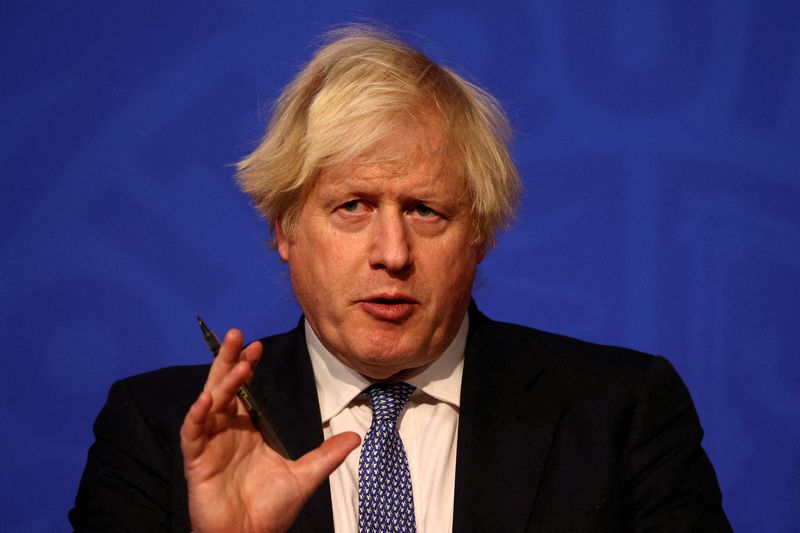 FILE PHOTO: British Prime Minister Boris Johnson holds a news conference, in London