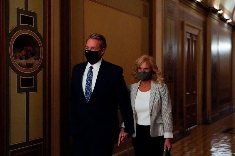 FILE PHOTO: Former Senator Jeff Flake (R-AZ) walks through the U.S. Capitol in Washington