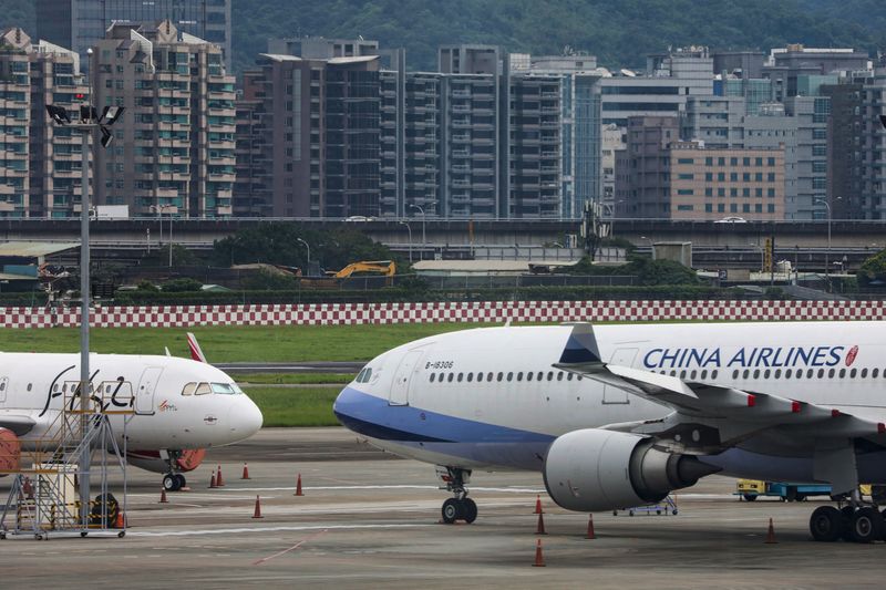 Passenger jets of Taiwan's China Airlines at Taipei Songshan Airport in Taipei,