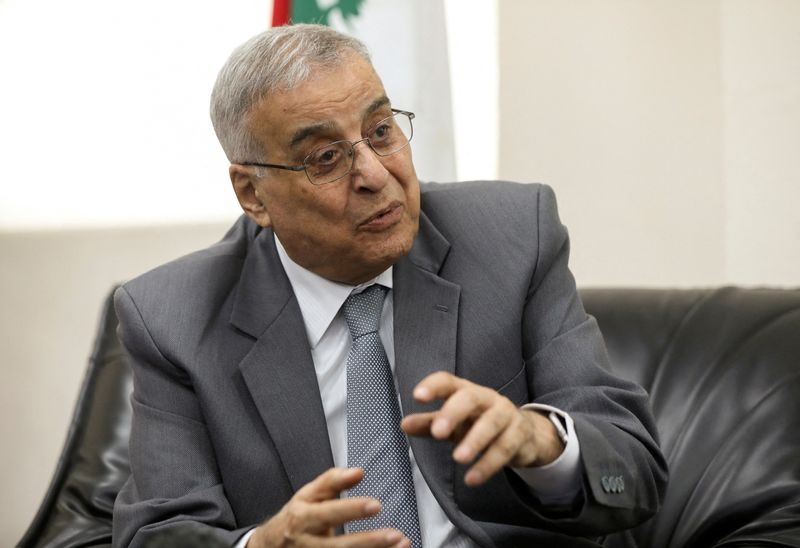 FILE PHOTO: Lebanese Foreign Minister Abdallah Bou Habib gestures as he speaks during an interview with Reuters in Beirut