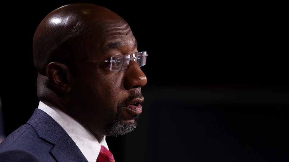 Sen. Raphael Warnock, D-Ga., speaks on Medicare expansion and the reconciliation package during a press conference with fellow lawmakers at the U.S. Capitol on Sept. 23, 2021, in Washington.