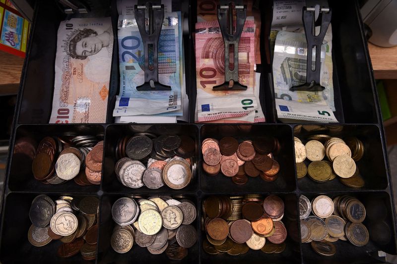 FILE PHOTO: A shop cash register is seen with both Sterling and Euro currency in the till at the border town of Pettigo