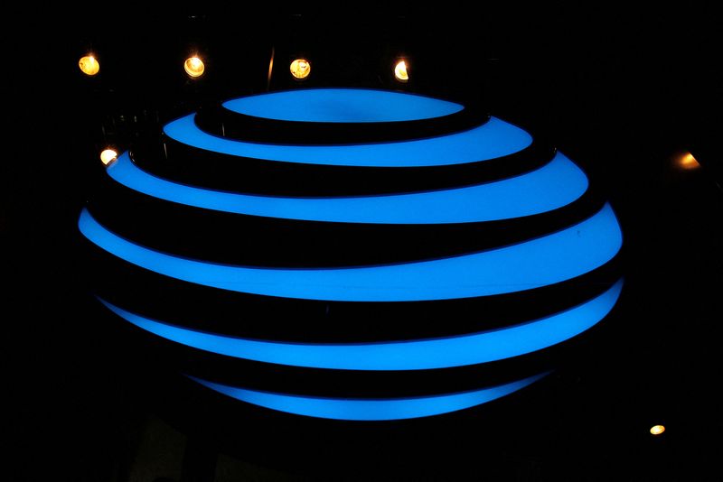 FILE PHOTO: The AT&T logo is seen in a store window in the Manhattan borough of New York City