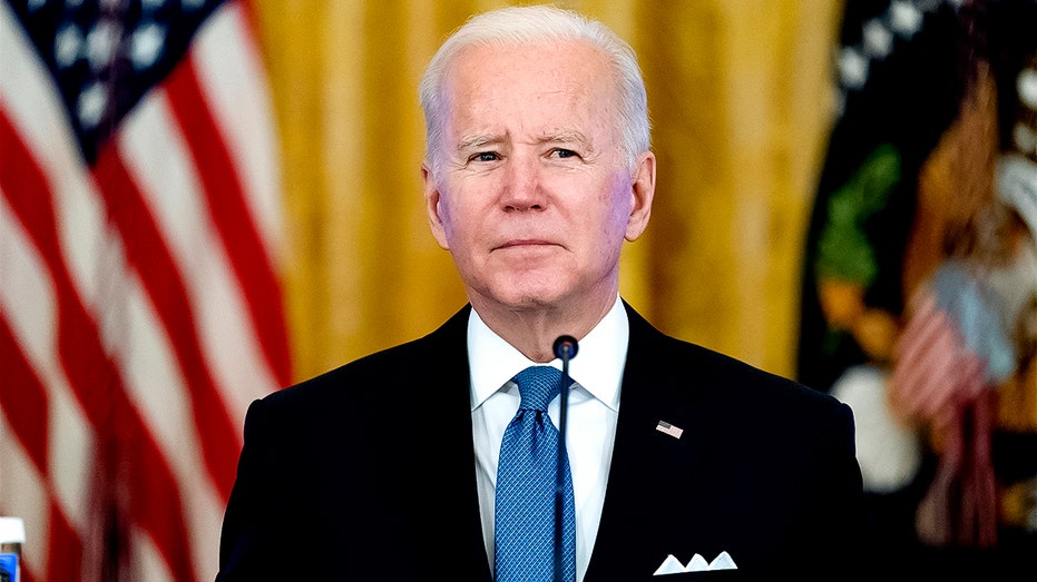 President Biden listens to reporter's questions during a meeting on efforts to lower prices for working families in the East Room of the White House in Washington, Monday, Jan. 24, 2022. 