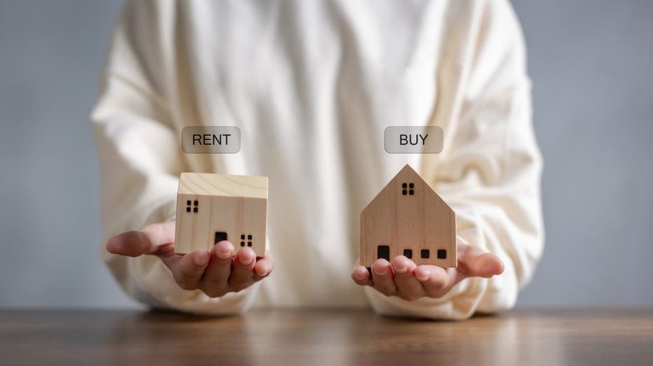 Person debate renting or buying home
