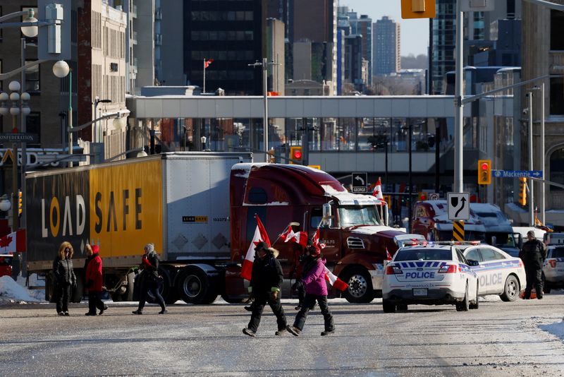 Protestors continue to clog downtown streets as truckers and supporters continue to protest against the coronavirus disease (COVID-19) vaccine mandates, in Ottawa