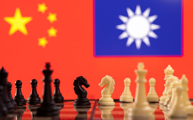 FILE PHOTO: Illustration shows China and Taiwan's flags