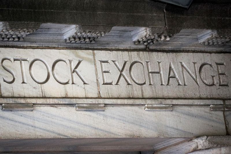 FILE PHOTO: Stock Exchange is seen over an entrance to the NYSE on Wall St. in New York