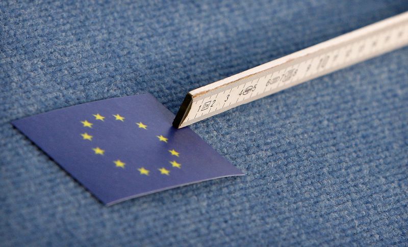 A ruler lies next to a Logo of the European Union during preparations for a family picture of the 8th ASEM Foreign Ministers meeting in Hamburg