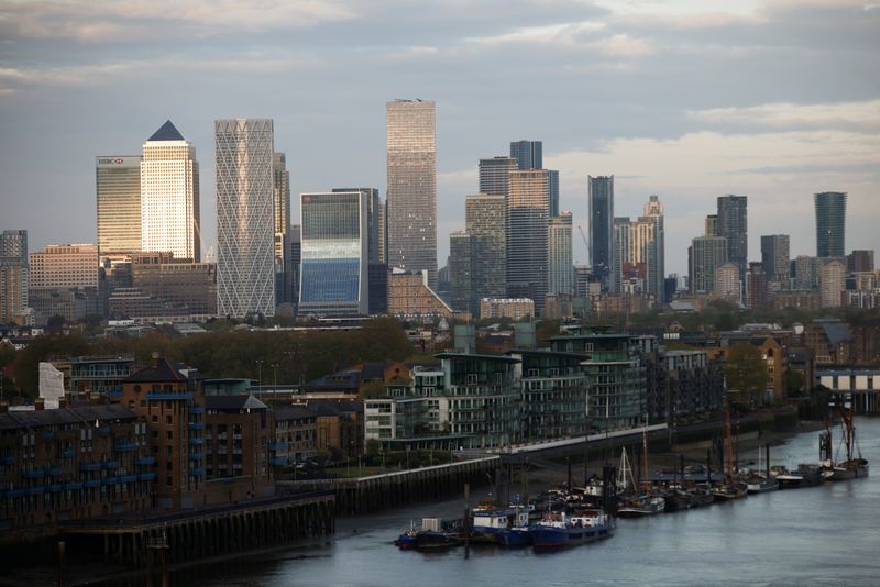 FILE PHOTO: Skyscrapers in The City of London financial district are seen from City Hall in London