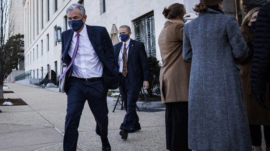 Jerome Powell, chairman of the U.S. Federal Reserve, leaves after testifying before a Senate Banking, Housing, and Urban Affairs Committee confirmation hearing in Washington, D.C., on Tuesday, Jan. 11, 2022.
