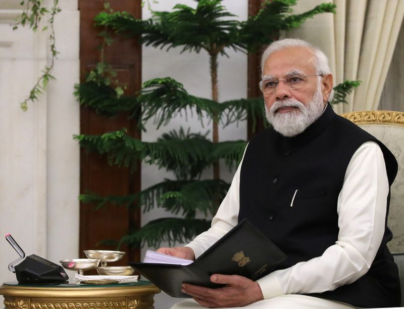 FILE PHOTO: India's Prime Minister Modi attends a meeting with Russia's President Putin in New Delhi