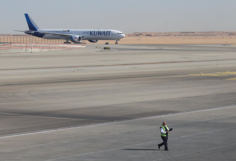 FILE PHOTO - A Kuwait Airways plane is parked at Cairo International Airport