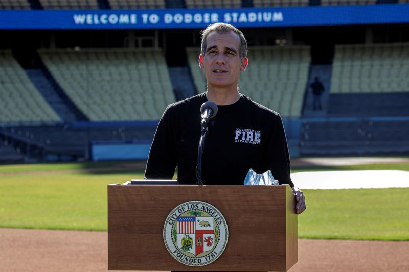 COVID-19 mass-vaccination of healthcare workers takes place at Dodger Stadium in Los Angeles