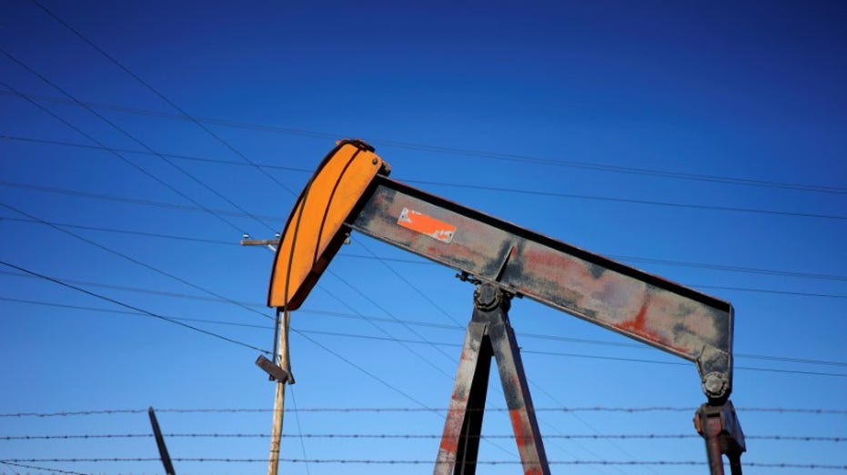 An oil well pump jack an oil field supply yard near Denver, Colorado, Feb. 2, 2015