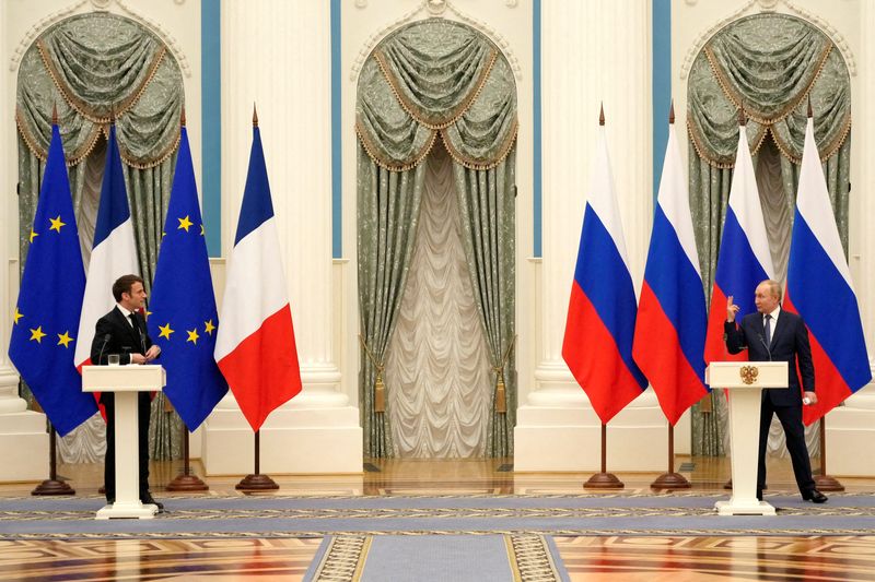 FILE PHOTO: Russian President Vladimir Putin meets with French President Emmanuel Macron in Moscow