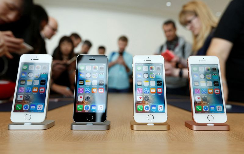 FILE PHOTO: The new iPhone SE is seen on display during an event at the Apple headquarters in Cupertino, California
