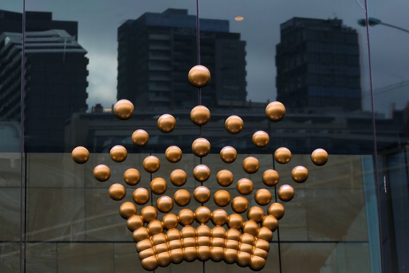 FILE PHOTO: The logo of Australian casino giant Crown Resorts Ltd adorns the hotel and casino complex in Melbourne, Australia