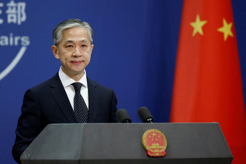 FILE PHOTO: Chinese Foreign Ministry spokesman Wang Wenbin speaks during a news conference in Beijing