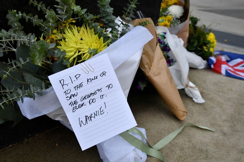 Tributes to cricketer Shane Warne are seen outside the Melbourne Cricket Ground in Melbourne