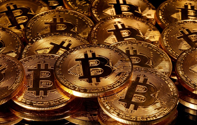 FILE PHOTO: FILE PHOTO: Representations of virtual currency Bitcoin are seen in this picture illustration taken