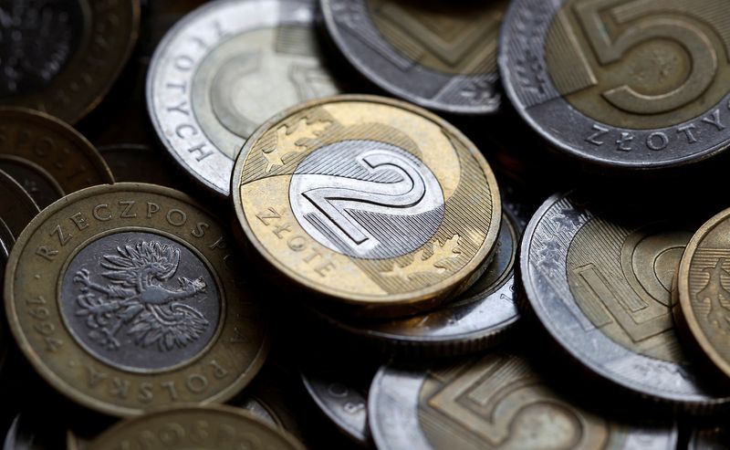 FILE PHOTO: Polish currency zloty coins are seen in this photo illustration taken in Warsaw