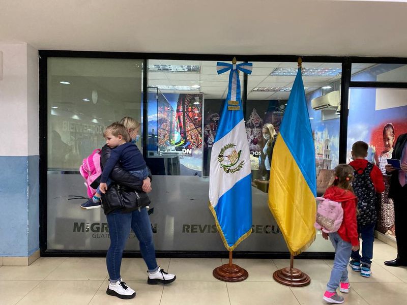 Ukrainian families fleeing their homeland following Russia's invasion arrive at Guatemala