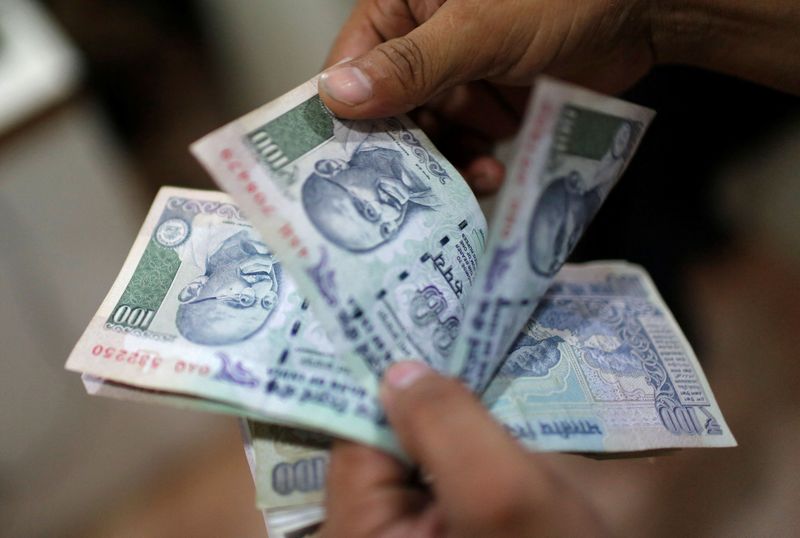 FILE PHOTO: Indian tax authorities seize $30 mln in cash ahead of state elections
