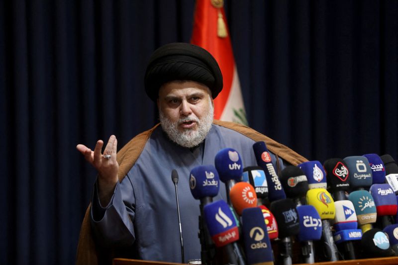 FILE PHOTO: Iraqi Shi'ite cleric Muqtada al-Sadr speaks during a news conference in Najaf