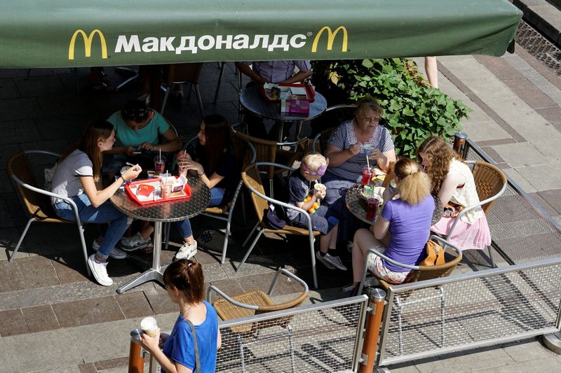 FILE PHOTO: People rest at McDonald's restaurant in central Moscow