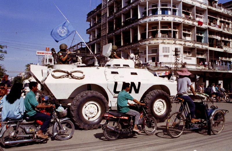 FILE PHOTO: UN peacekeepers patrol the streets of Phnom Penh in an armoured personnel carrier